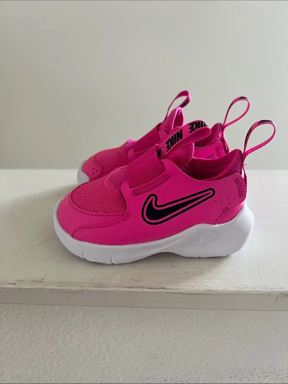 Nike Kids Hot Pink Slip-On Sneakers with Black Swoosh